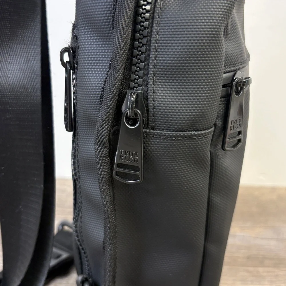 True Religion “Jody” Sling Bag | Black Logo Lined Crossbody